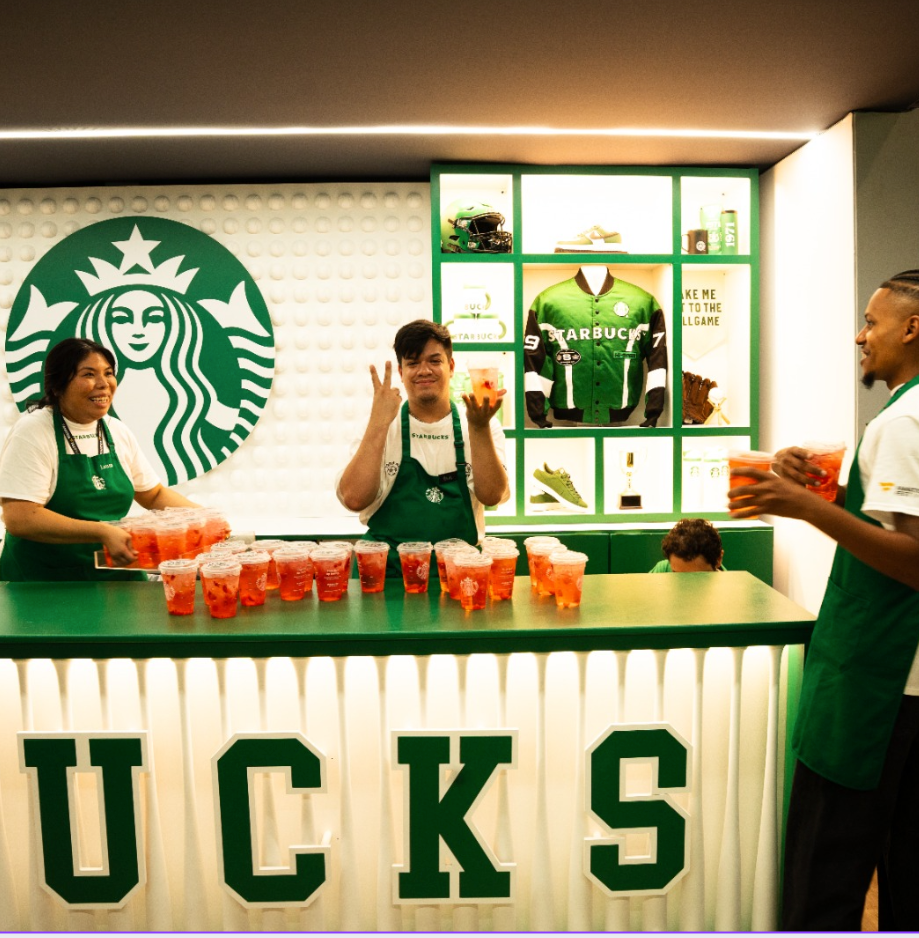 Starbucks ballpark activation bar with branded build-out and on-site team serving drinks